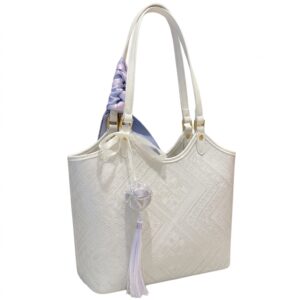 Handwoven ivory white geometric U‑style tote bag. Clean lines, soft texture, and a story of harmony. Fits a 13" laptop, water bottle, and daily essentials. Lightweight yet sturdy – the perfect everyday companion.